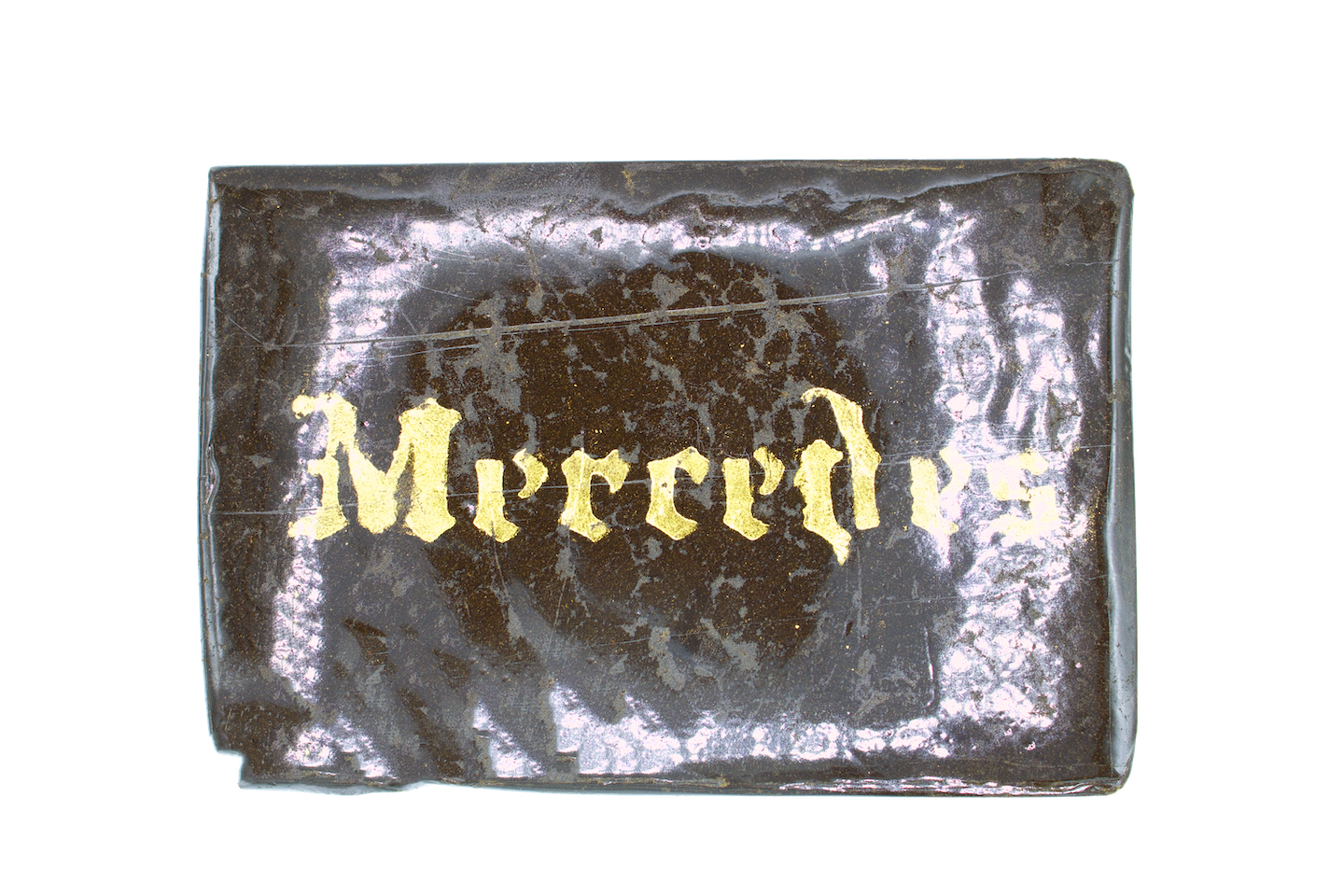 Mercedes Hash Two rectangular stacked pieces of light brown compressed material with a layered texture photographed on a plain background.