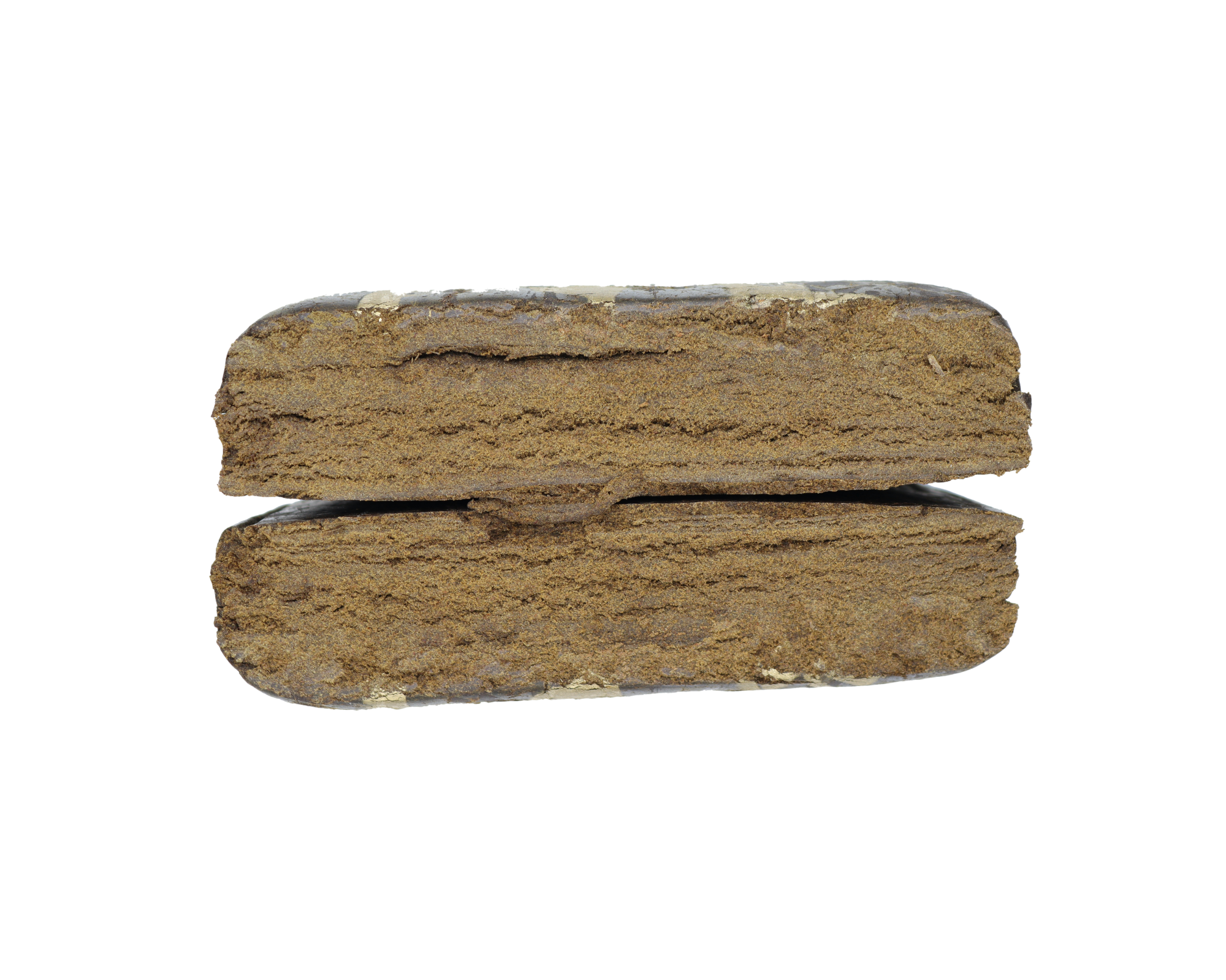 Apple Cut Two rectangular pieces of brown compressed material stacked horizontally on a plain background, showing a textured cut surface.