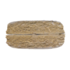 Rectangular brown compressed material with a textured surface photographed on a plain background.
